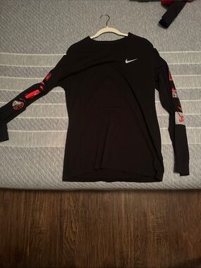 Nike Black Long-Sleeve Tee with Red Sleeve Graphics